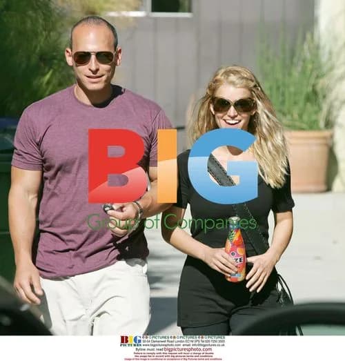 Jessica Simpson Leaves Gym With Trainer