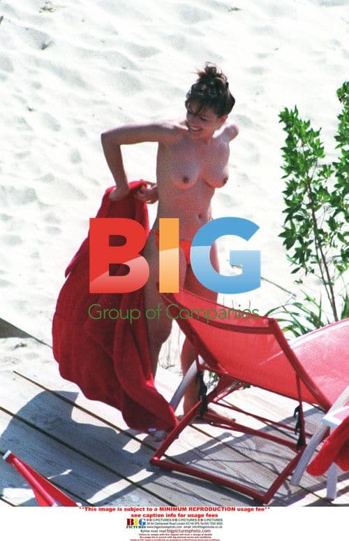 Liz Hurley topless on holiday in St. Barthelemy