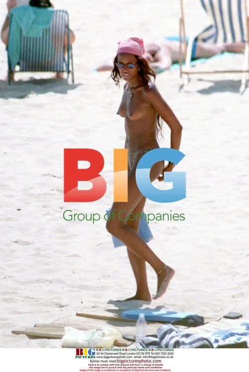 Naomi Campbell and Flavio Briatore on beach in France