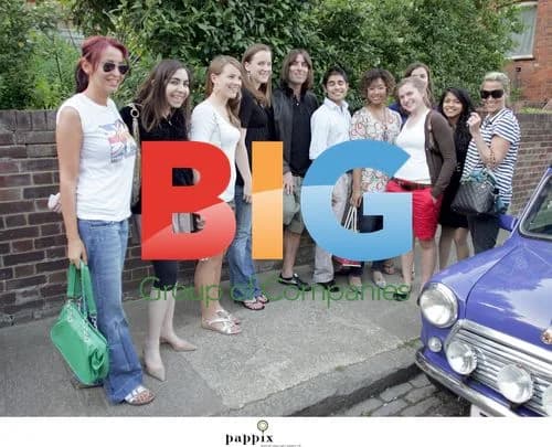 Liam Gallagher poses with teens in London
