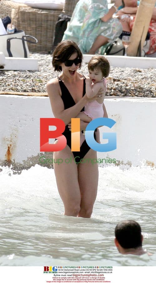 Katie Holmes and Suri swim in the Mediterranean
