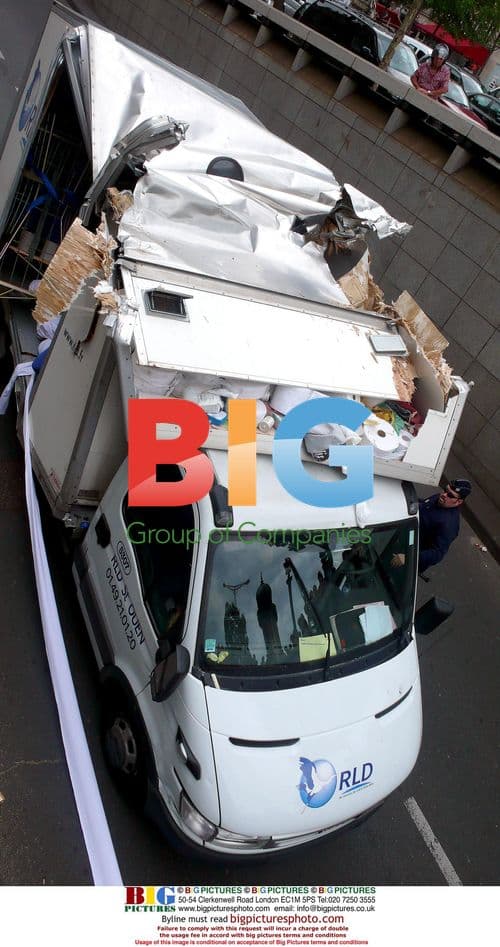 Truck Wedged Under Champs-Elysees Tunnel