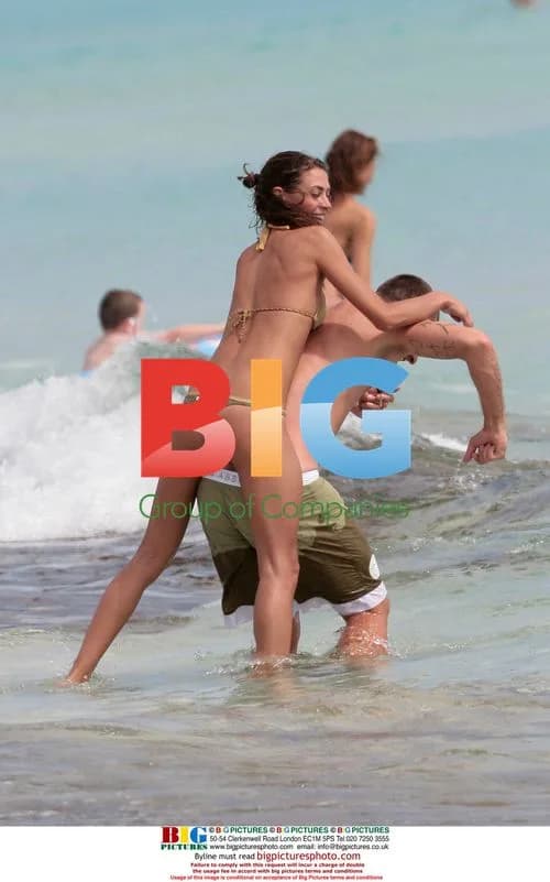 Cristian Vieri and Melissa Satta flirting on beach