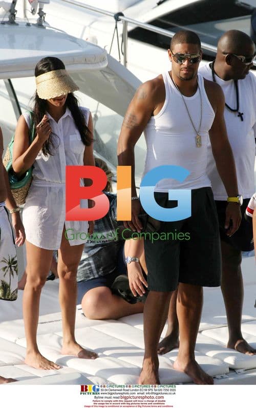 Adriano returns from boat trip in Sardinia