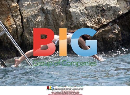 Newlyweds James Packer and Erica Baxter swim at Eden Roc Hotel