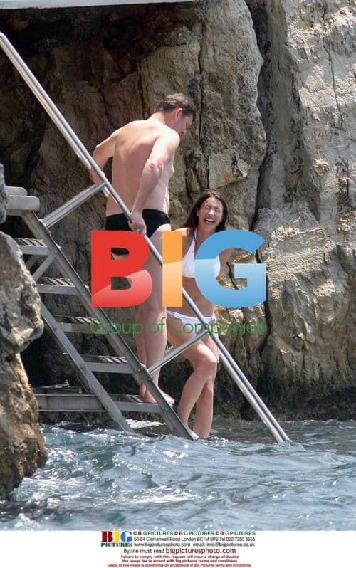 Newly Weds Packer and Baxter Swim After Wedding