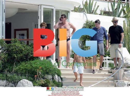 Billionaire Newlyweds Swim at Eden Roc Hotel