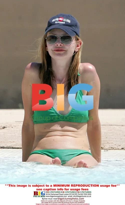 Calista Flockhart Takes Son Liam to Pool