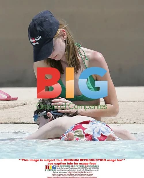 Calista Flockhart and son Liam at pool