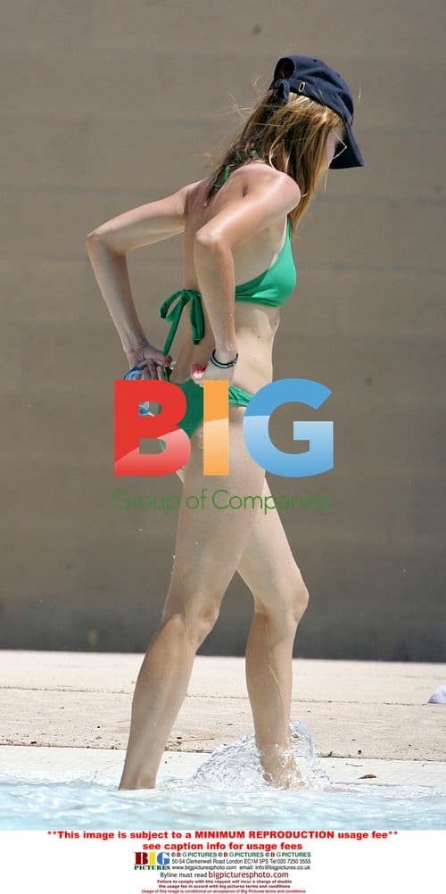 Calista Flockhart and son Liam at pool