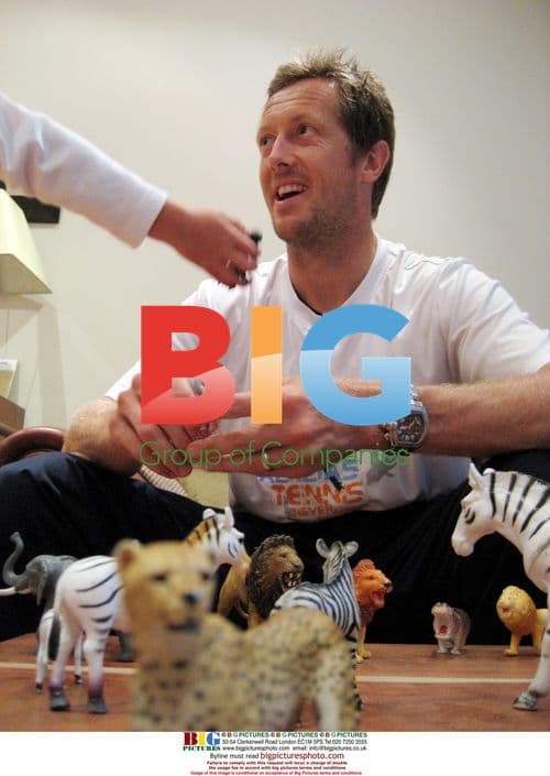 Jonas Bjorkman and son Max at Wimbledon 2007