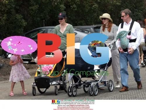 Marcia Cross Tries on Hats at Farmer's Market