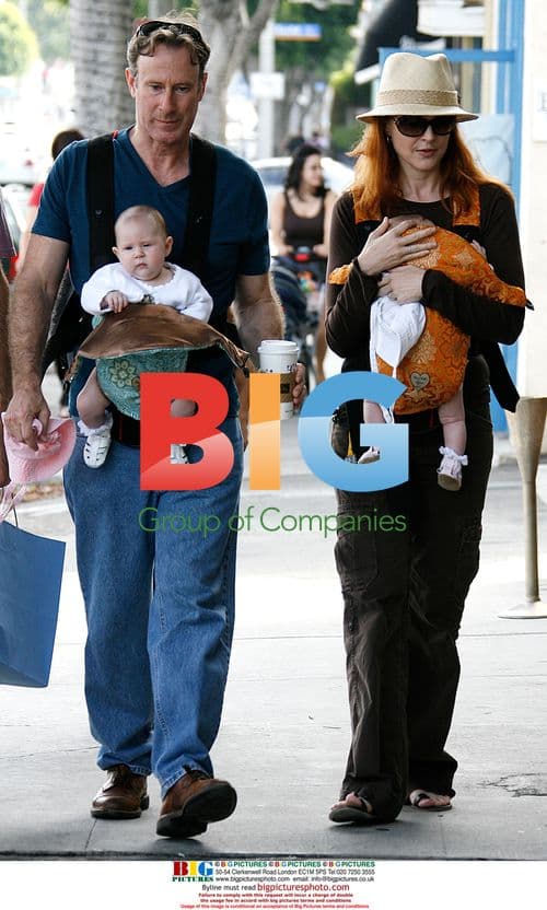 Marcia Cross and family shopping
