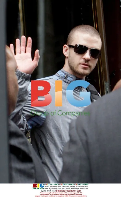 Justin Timberlake leaves hotel with mother
