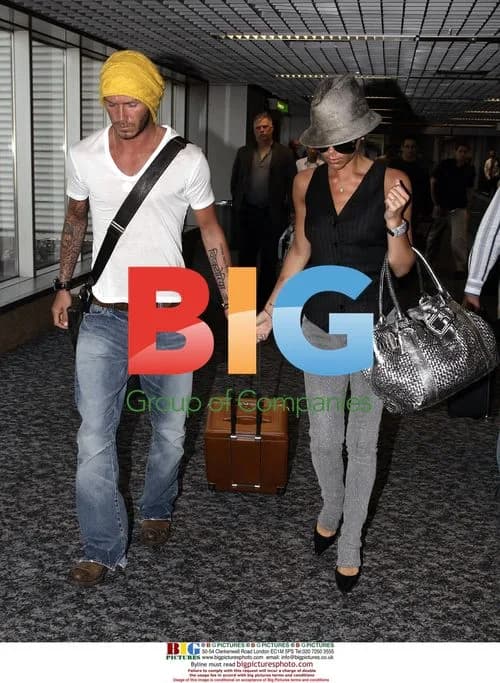 Beckhams Arrive at Heathrow from Singapore