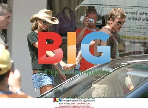 David and Victoria Beckham strolling in St. Tropez