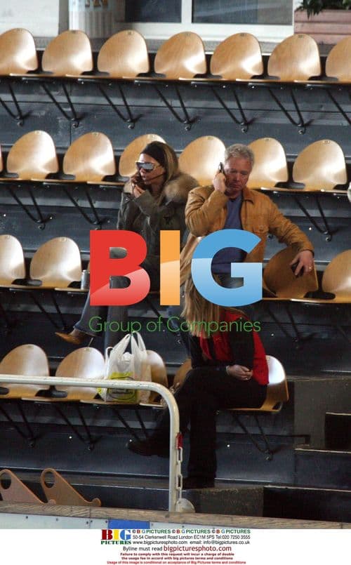 Victoria Beckham and son at skating rink in Courchevel