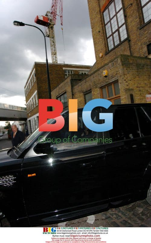 Victoria & David Beckham Leave Studio