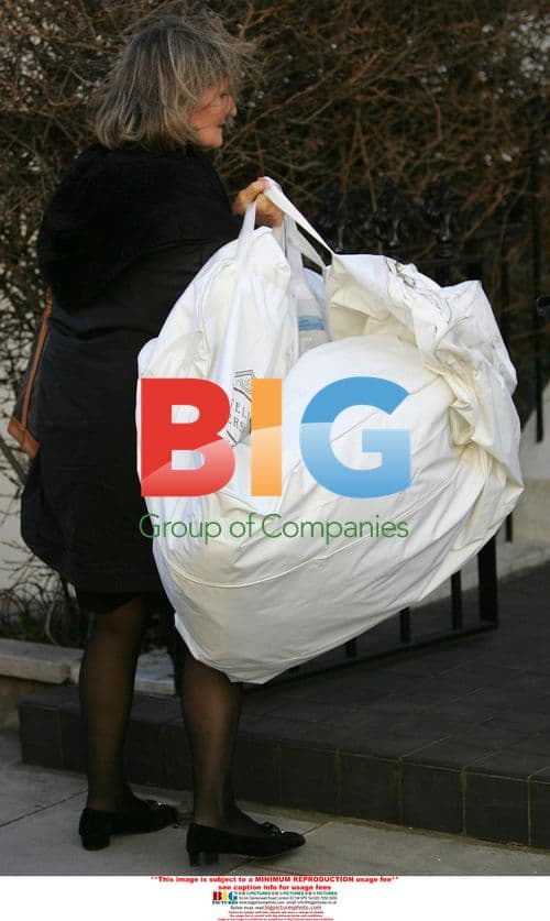 Versace Stylists Arrive at Liz Hurley's Home