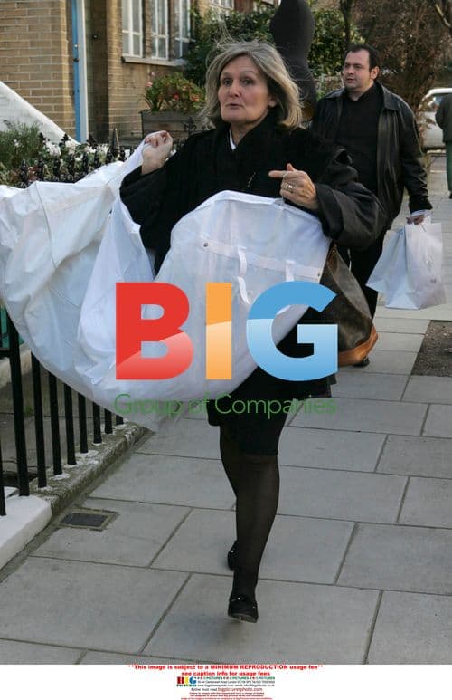 Versace Stylists Arrive at Liz Hurley's House