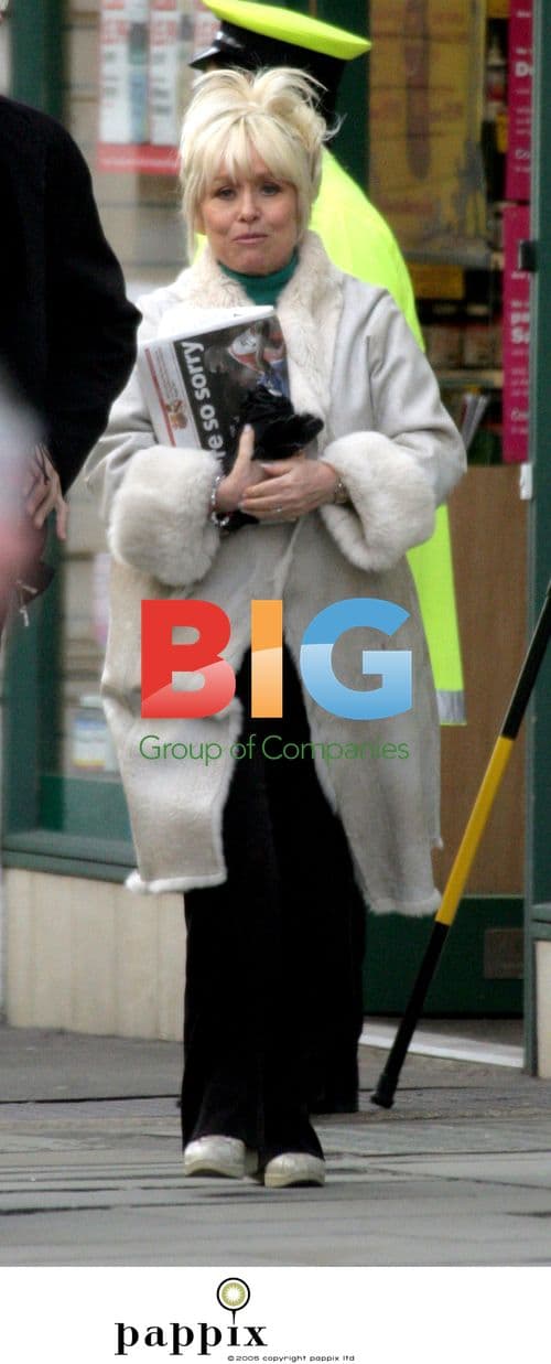 Barbara Windsor and Dale Winton shop in London