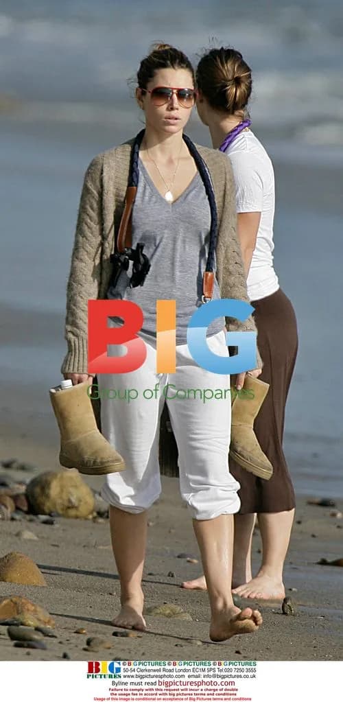 Jessica Biel walks dogs on Malibu beach