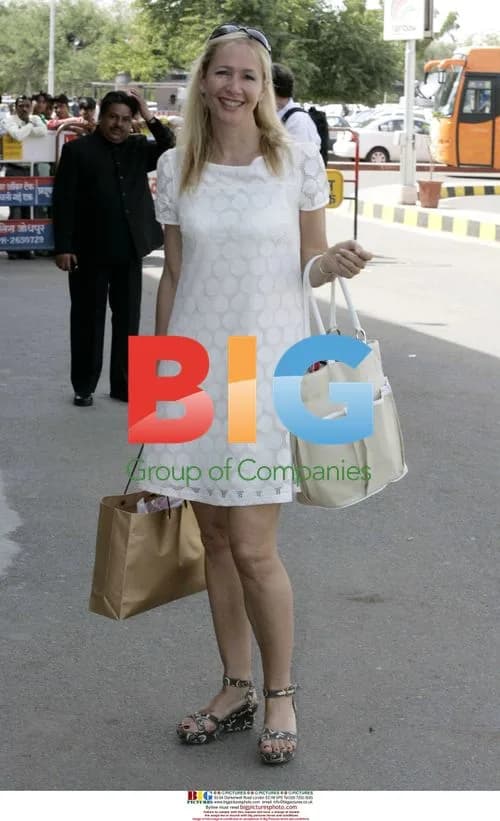 Liz Hurley and Arun Arriving at Airport Before Honeymoon