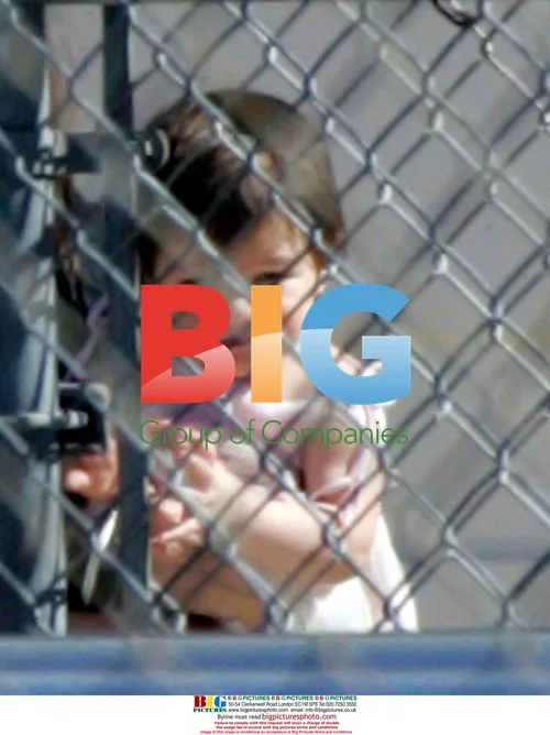 Tom Cruise, Katie Holmes, and Suri at Beverly Hills High School