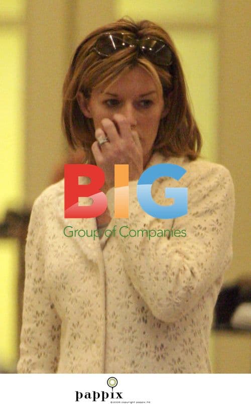 Andrea Catherwood out shopping with son