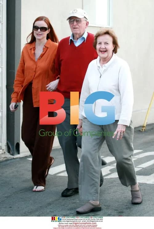 Marcia Cross out with parents