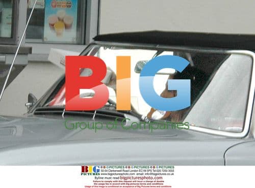 Jessie Wallace buys doughnuts