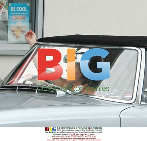 Jessie Wallace buys doughnuts