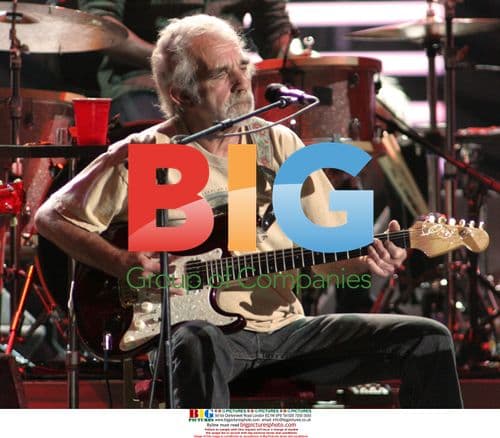 J.J. Cale and Eric Clapton perform in concert