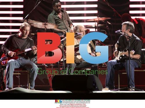 Derek Trucks, Steve Jordan, J.J. Cale, Eric Clapton, and Willie Weeks Perform in Concert