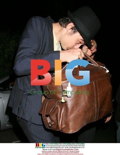 Pete and Kate Emerge from London Home