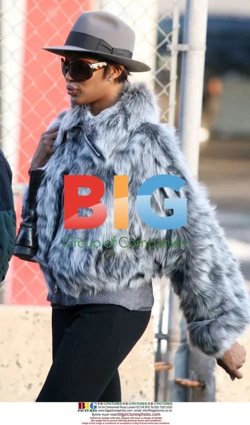 Naomi Campbell Reports for Community Service