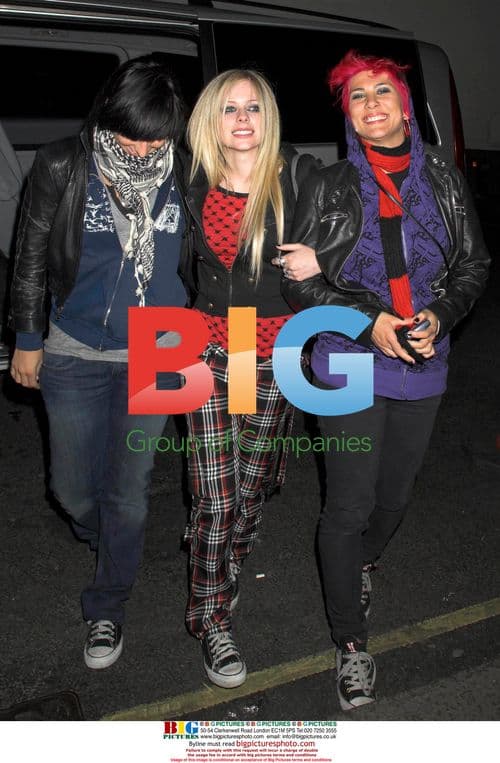 Avril Lavigne with her band at May Fair Hotel, London