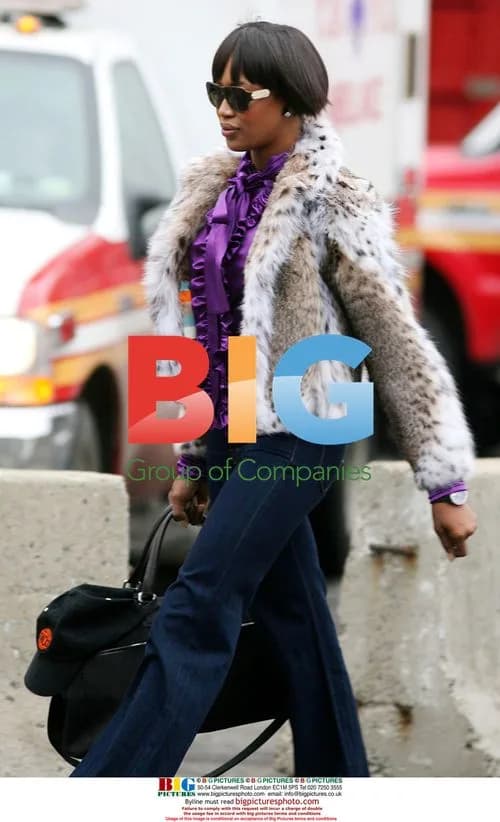 Naomi Campbell Reports for Community Service