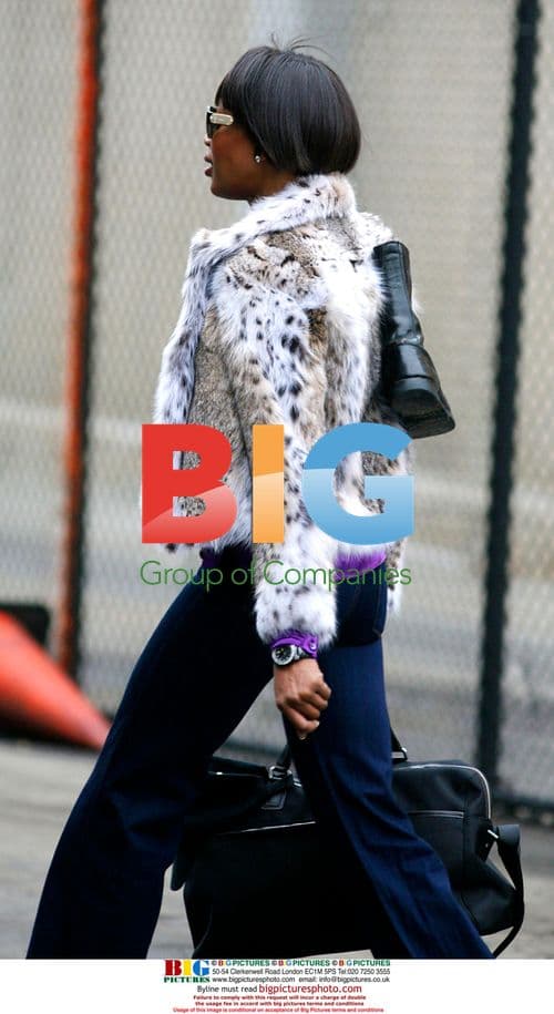 Naomi Campbell Reports for Community Service