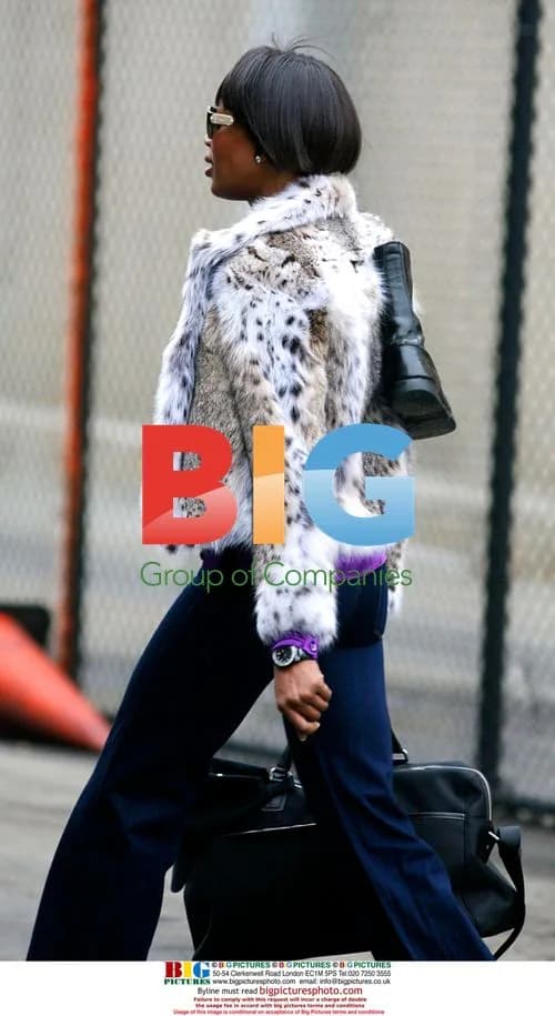 Naomi Campbell Reports for Community Service