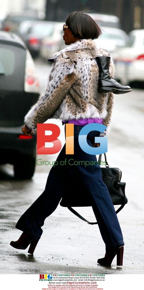 Naomi Campbell Reports for Community Service