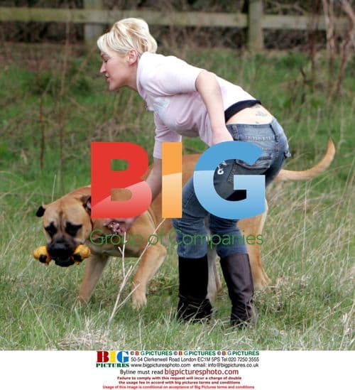 Jo O'Meara Plays Fetch With Dog