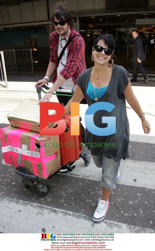 Lily Allen Arrives in London