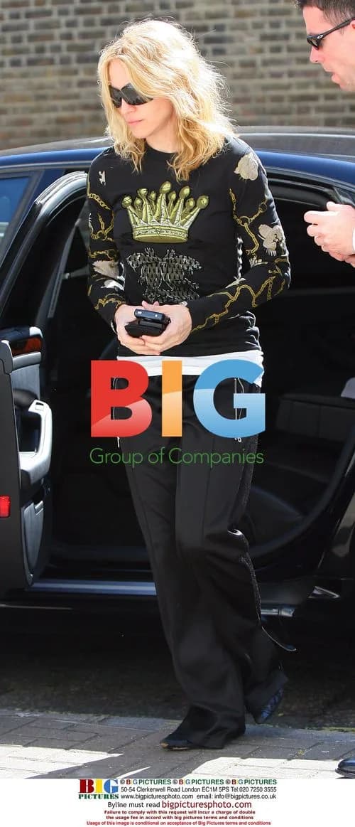 Madonna Leaves London Gym in Crown