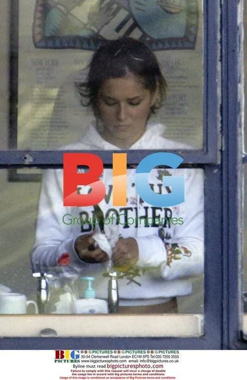 Cheryl Cole taking a break during Girls Aloud rehearsal