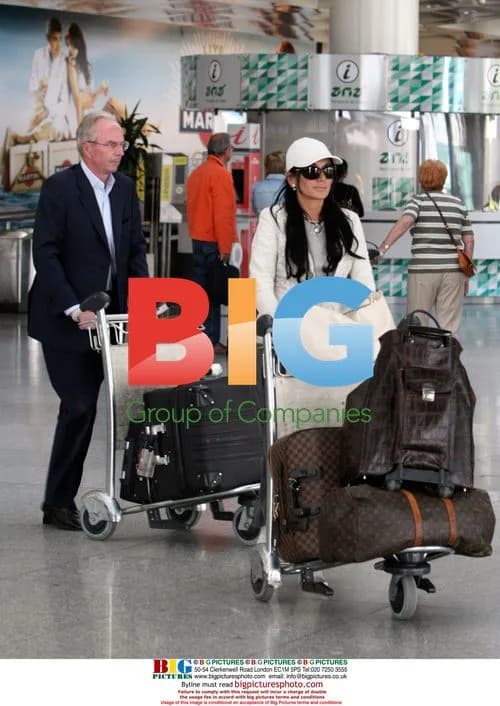 Sven Goran Eriksson and Nancy dell'Olio at Lisbon Airport