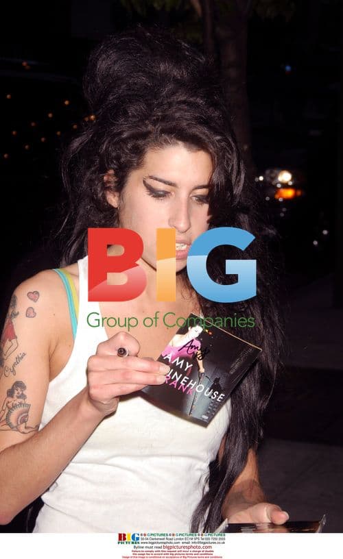 Amy Winehouse Signs CDs in NYC