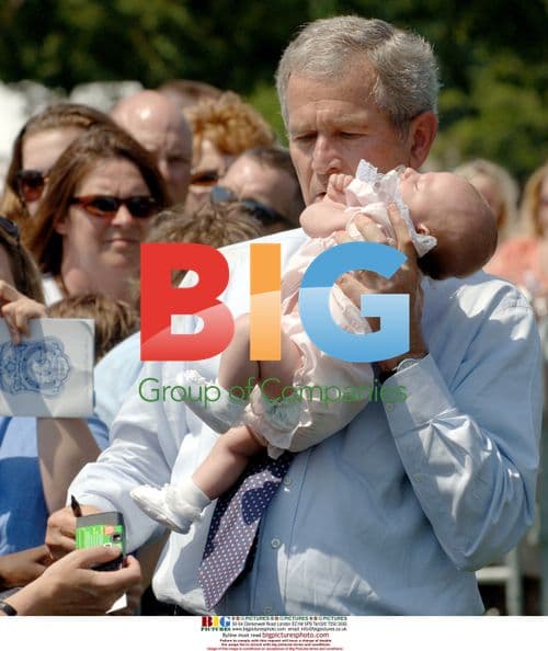 Bush Holds Infant at Peace Officers' Memorial