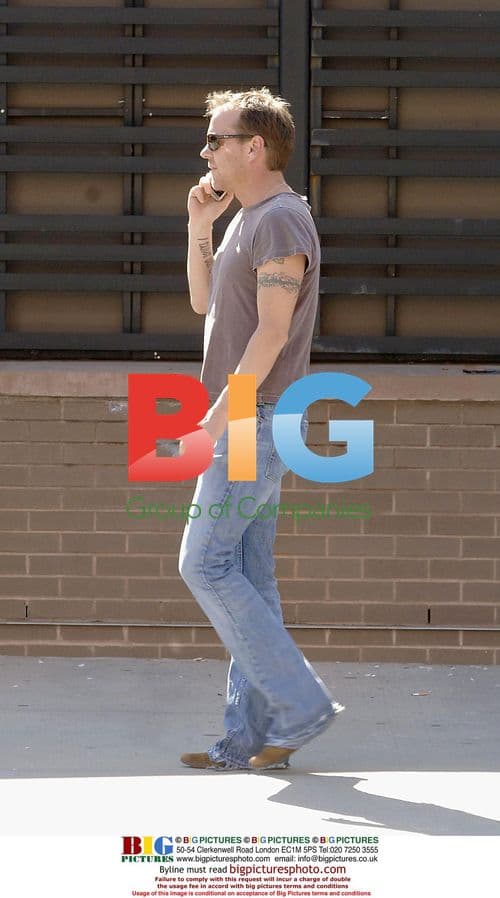 Kiefer Sutherland on the phone in LA