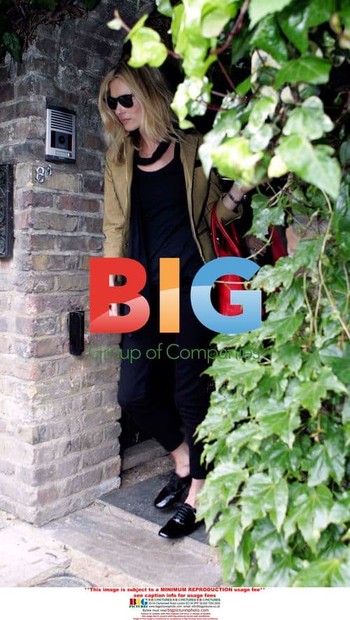 Kate Moss Leaves Home with Swollen Cheek
